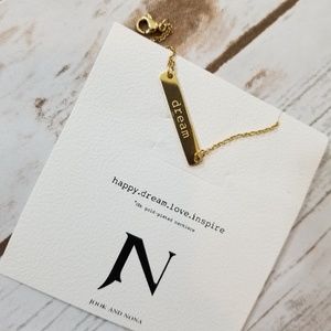 Gold engraved necklace.